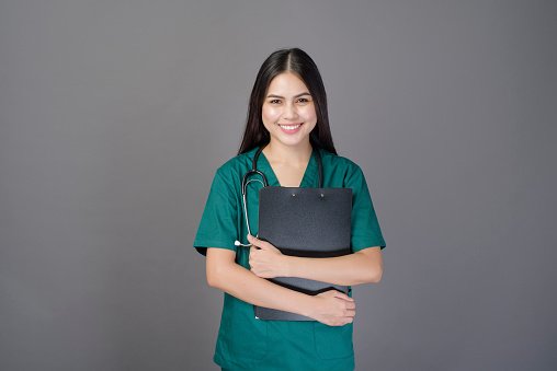 A clinician holding a clipboard