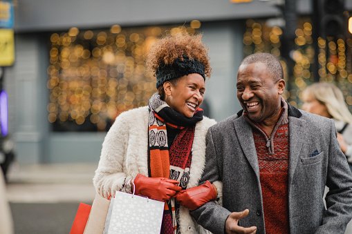 A couple out together with shopping bags