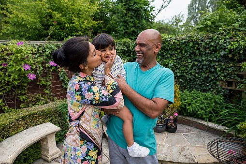 A family embracing outdoors