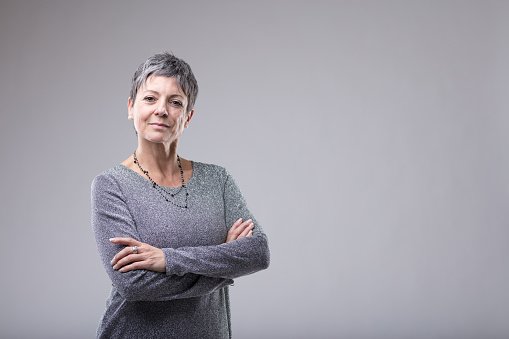 An experienced doctor with arms crossed